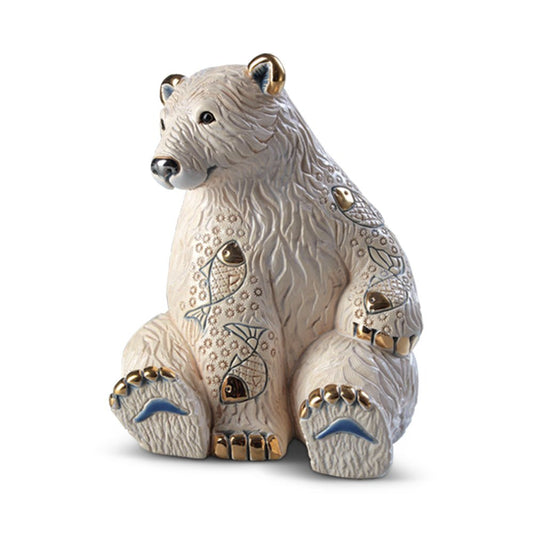 Hand-painted ceramic polar bear with fish details, small wildlife sculpture. Small ceramic polar bear with fish detail, hand-painted in Uruguay. A symbolic wildlife sculpture rooted in traditional craftsmanship. Ceramic Polar Bear Figurine with Fish Detail – Handcrafted Wildlife Art.