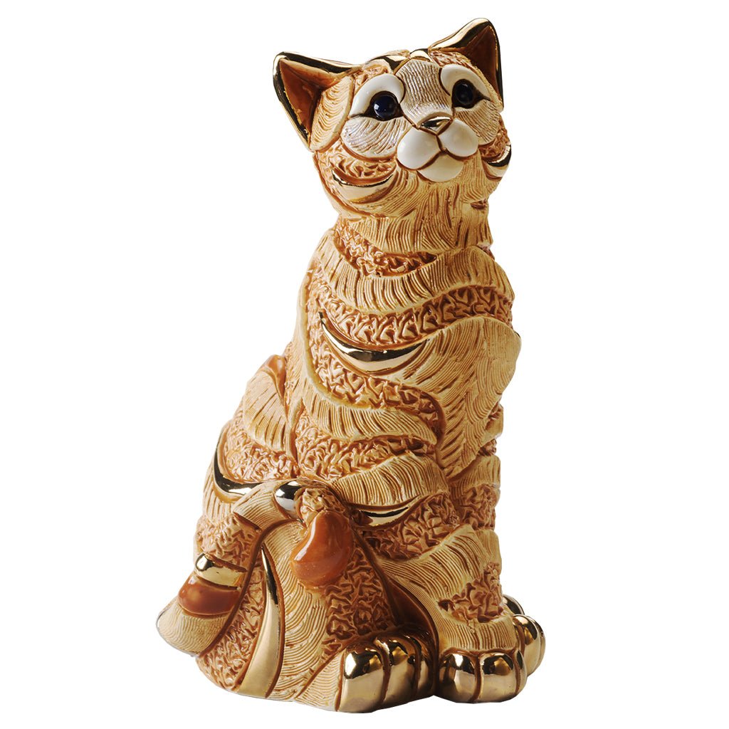 Hand-painted orange tabby cat sculpture with platinum & gold accents. Artisan-crafted Uruguayan collectible figurine symbolizing feline grace and independence.