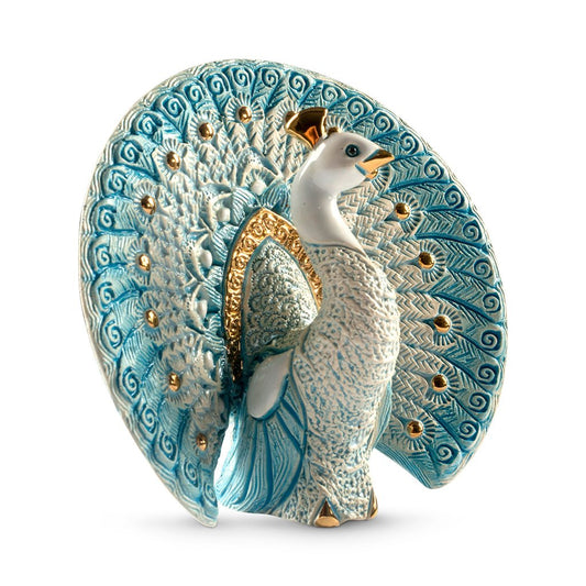 Hand‑carved enamel peacock figurine with gold and platinum accents. Compact symbol of beauty, renewal. Gift‑boxed with authenticity.