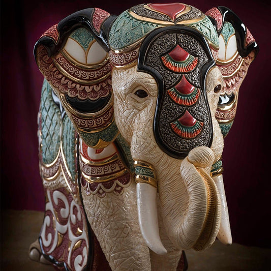Limited‑Edition Ceramic Elephant Statue. Hand‑Painted Royal Elephant Figurine. Jewel‑Tone Elephant Home Décor Sculpture. Artisan Ceramics Elephantry Ornament. Regal Trunk‑Raised Elephant Artwork. Heritage‑Style Elephant Collectible. Limited Collectible Elephant Sculptural Art.